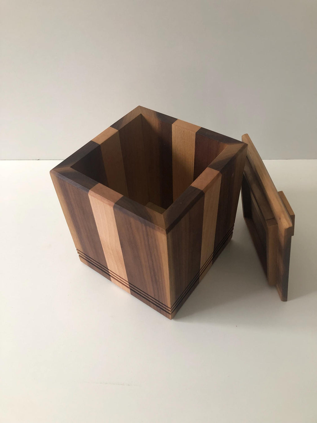 Handcrafted memorial urns. Wood, maple and walnut