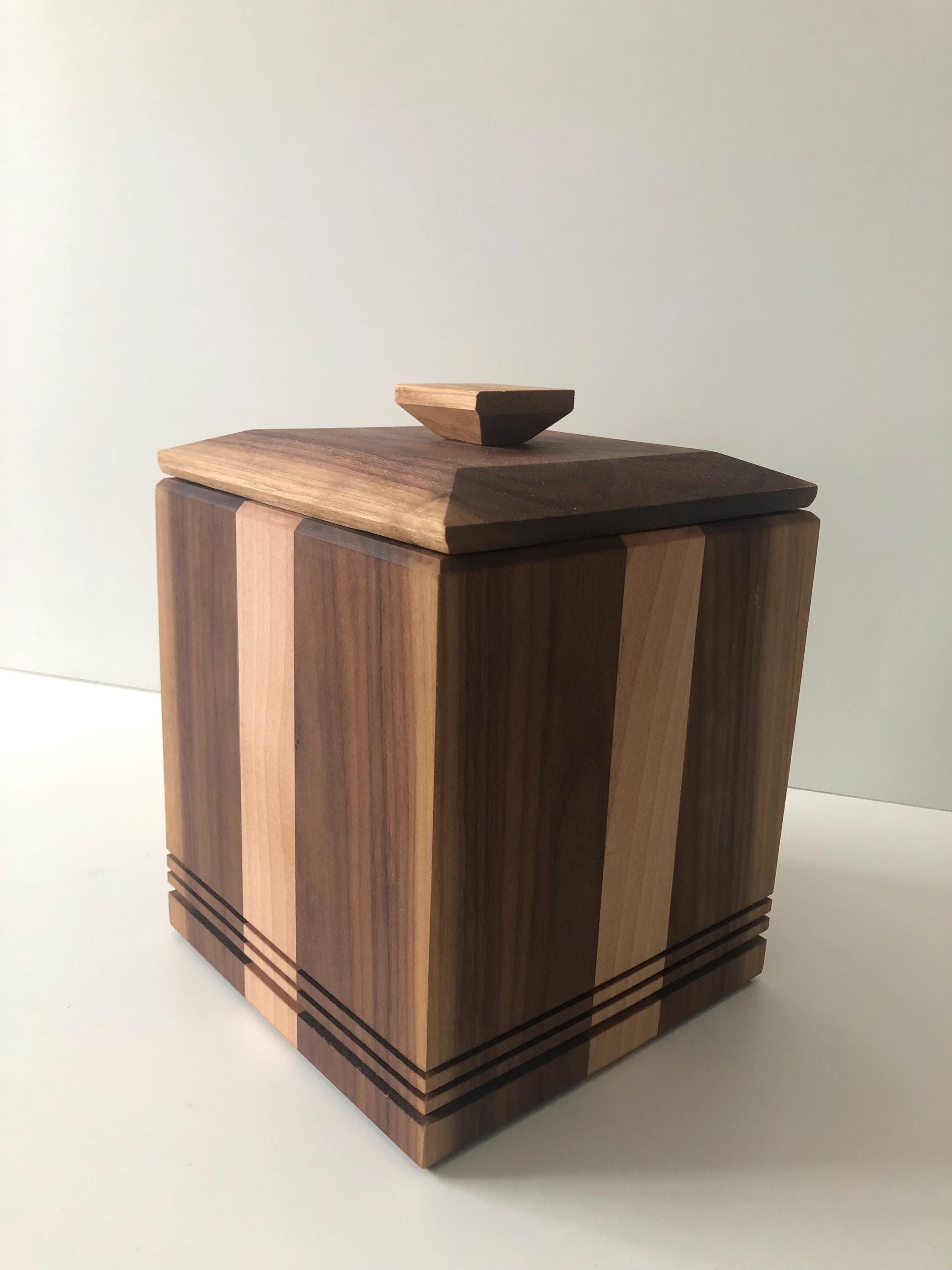 Handcrafted memorial urns. Wood, maple and walnut