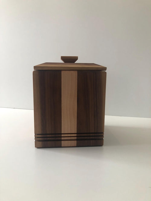 Handcrafted memorial urns. Wood, maple and walnut
