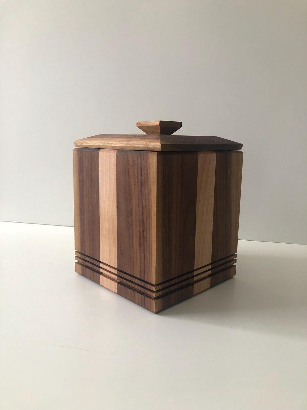 Handcrafted memorial urns. Wood, maple and walnut