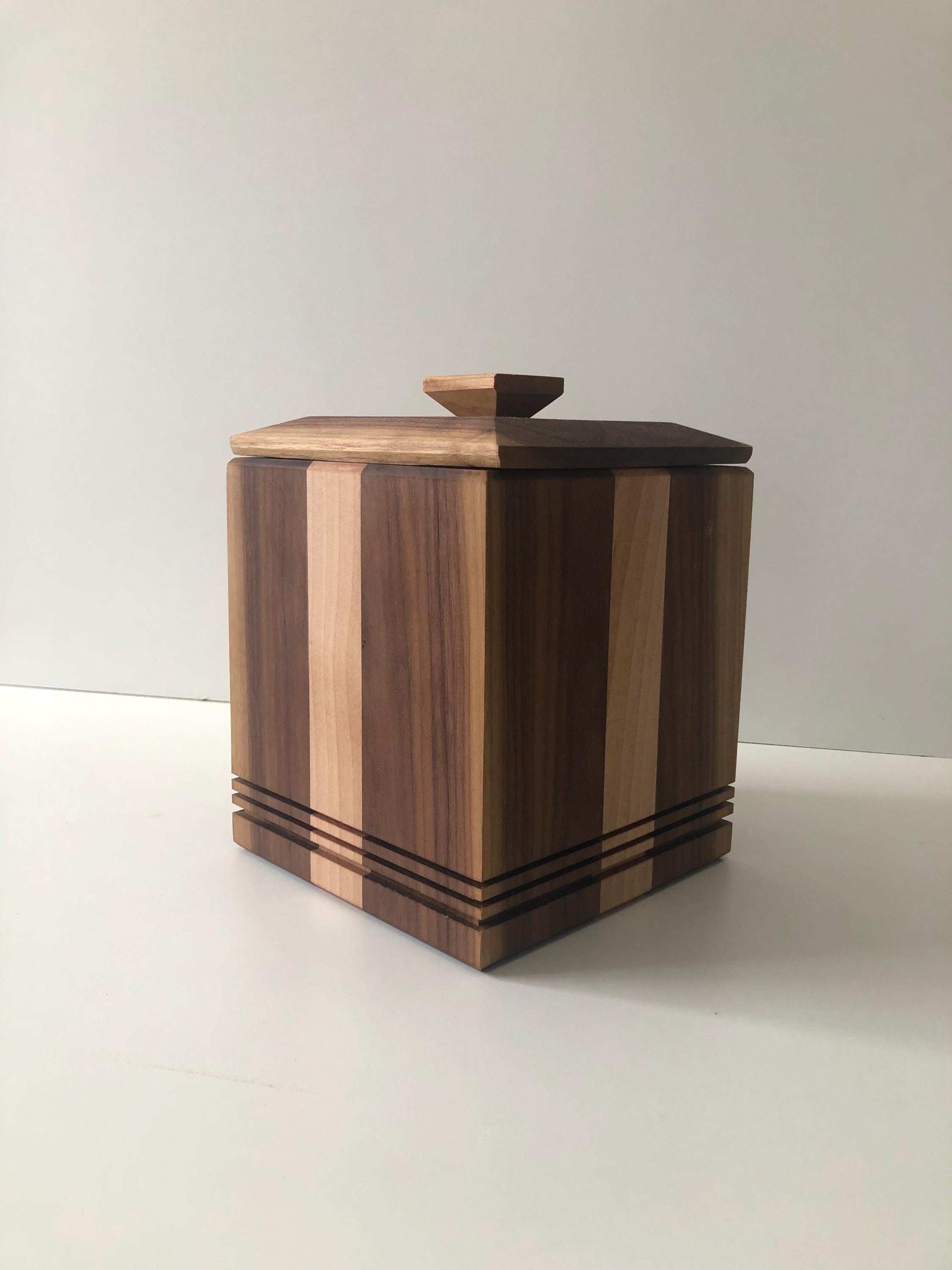 Handcrafted memorial urns. Wood, maple and walnut