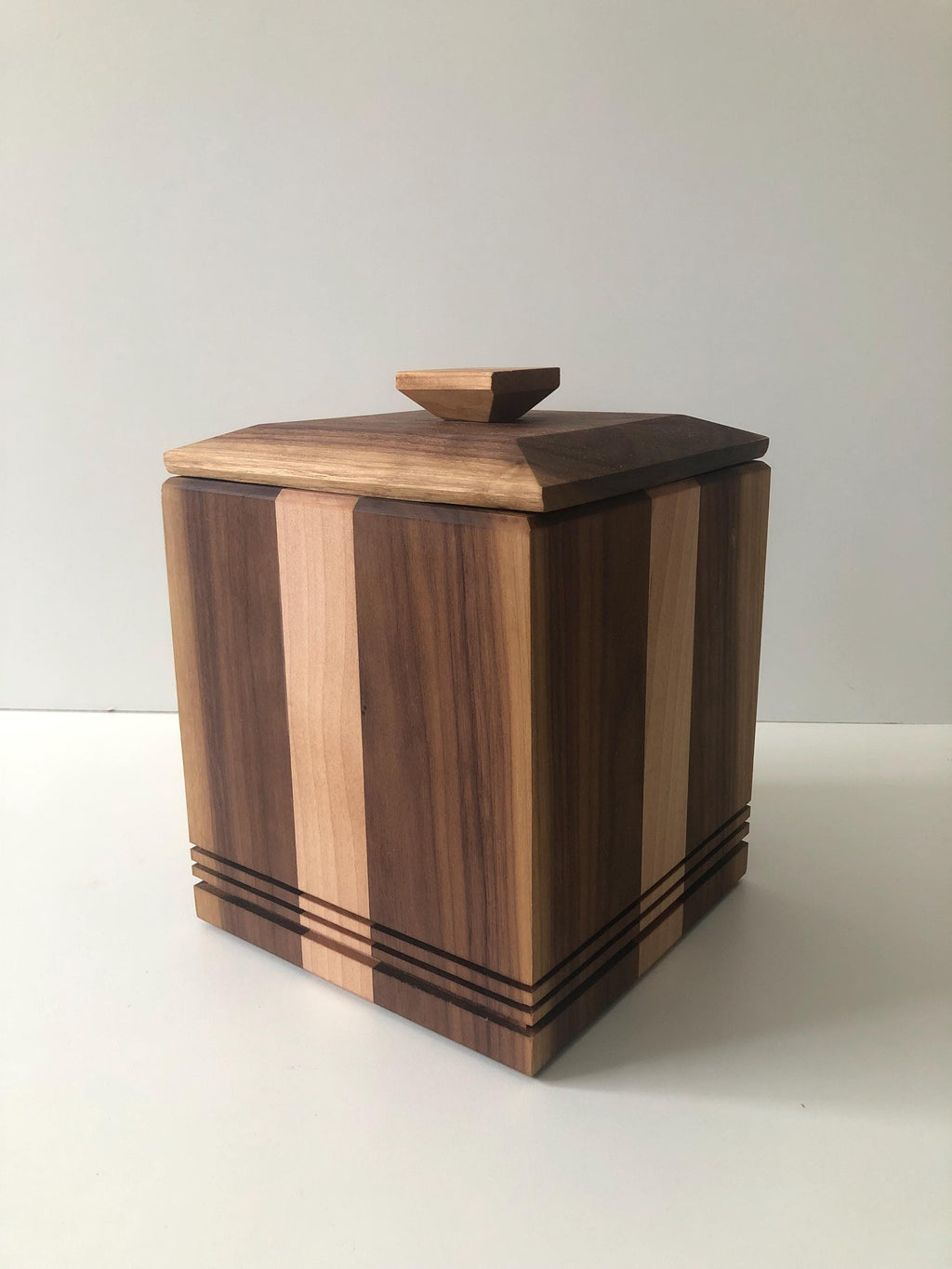 Handcrafted memorial urns. Wood, maple and walnut